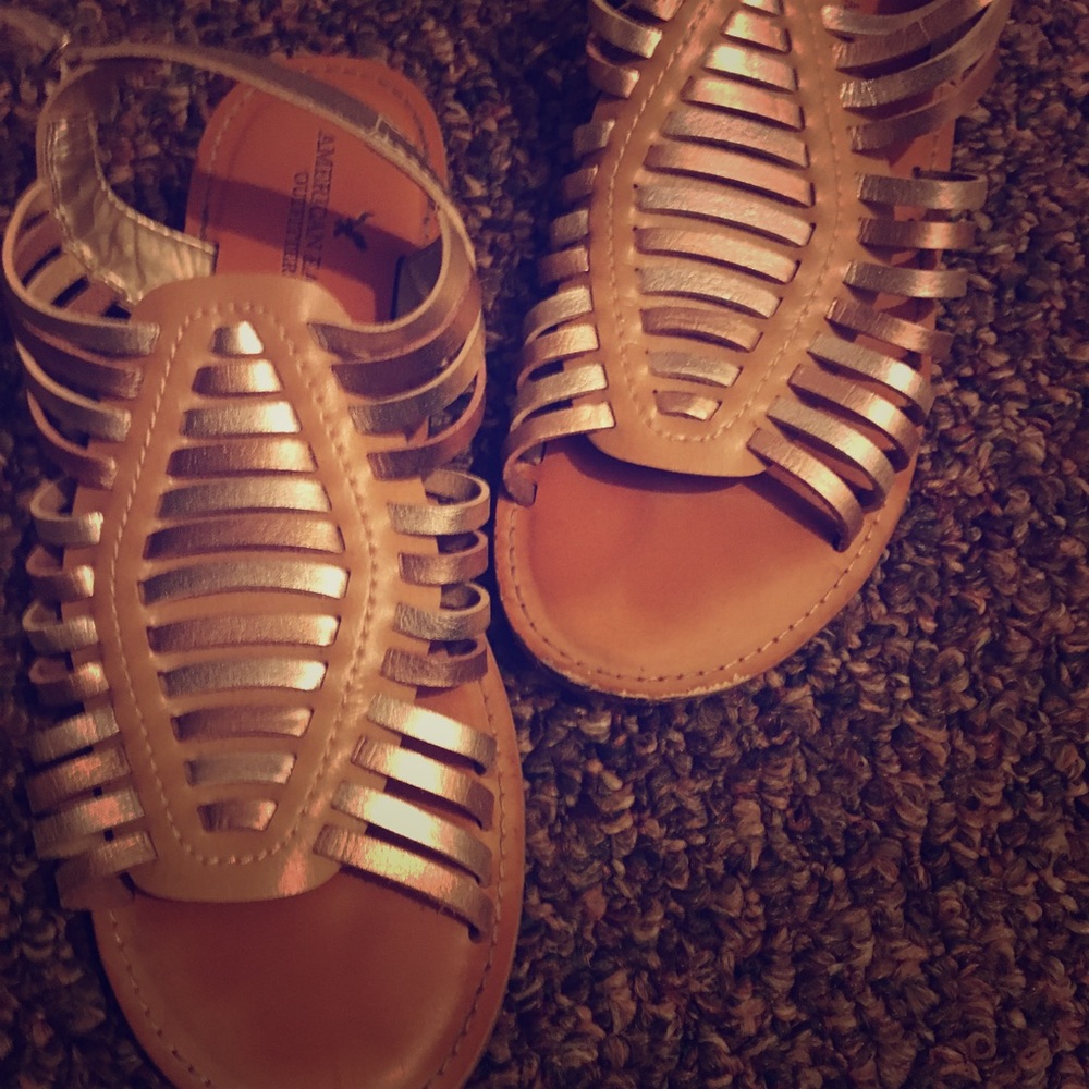 American eagle gold and rose gold leather sandals